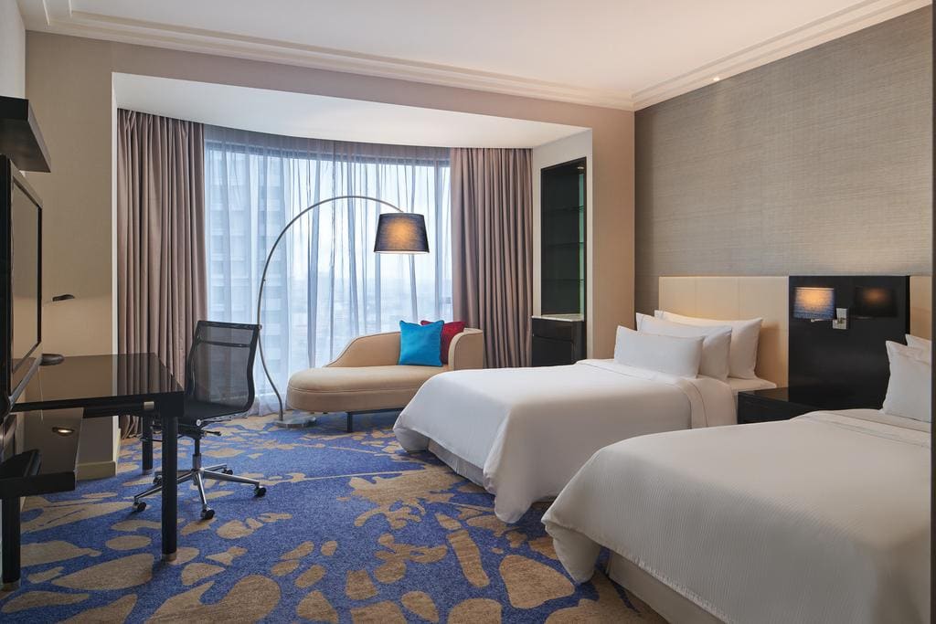 Elegant Rooms with Signature Beds