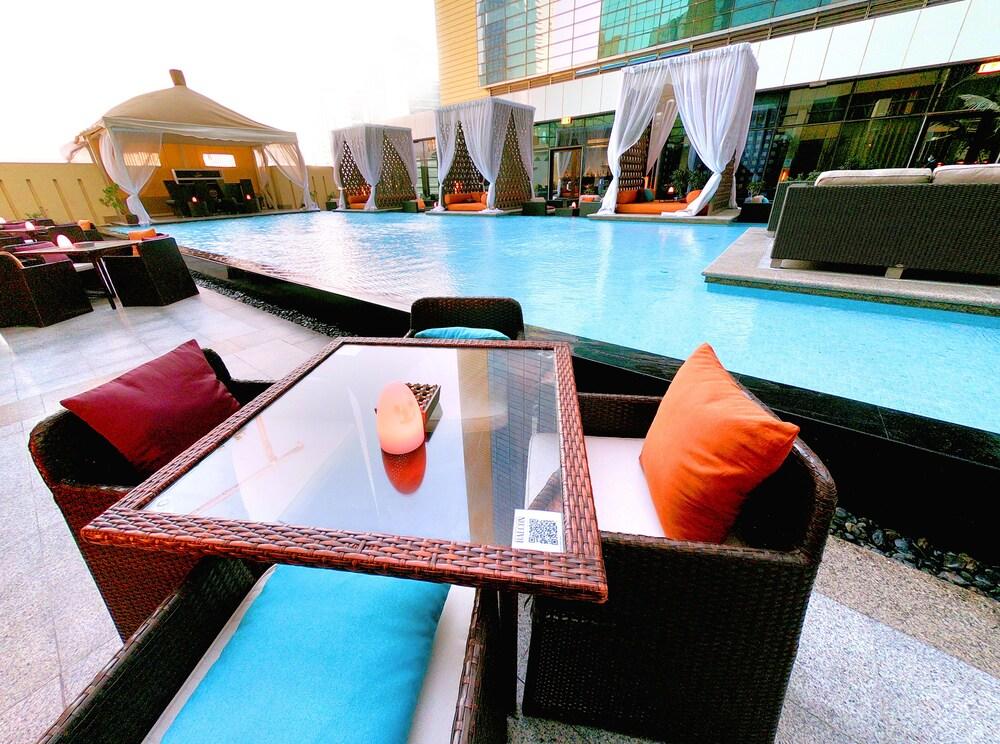 Outdoor Pool with Private Cabanas