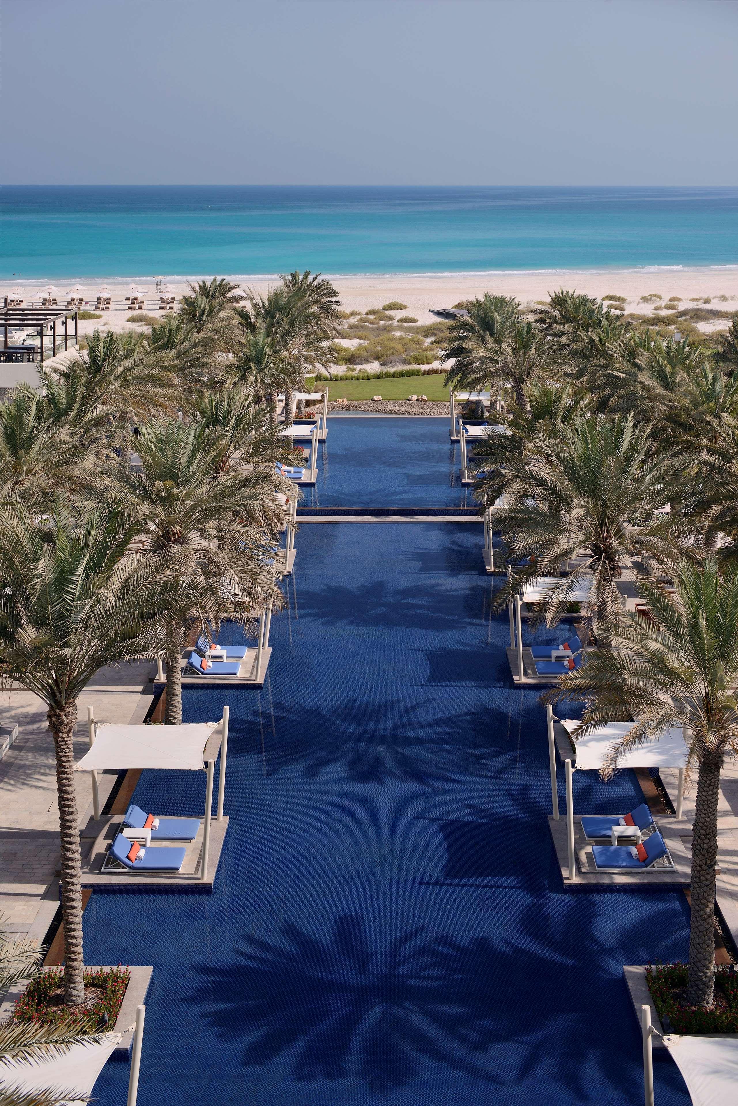 Beachfront Pool & Private Cabanas