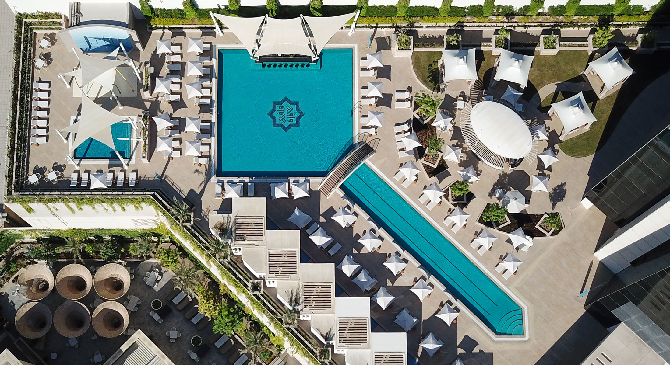Outdoor Pool with Private Cabanas