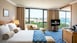 Luxe Rooms with Sea/City Views